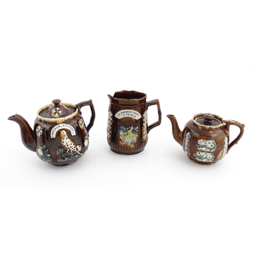 75 - Three items of Victorian Measham bargeware comprising a teapot decorated with birds and flowers with... 