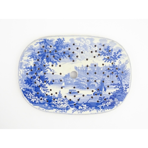 76 - A blue and white drainer decorated in the English Scenery pattern, depicting Windsor castle from the... 