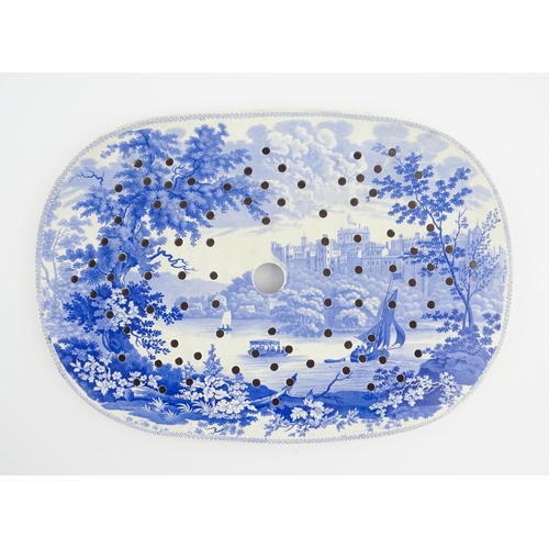 76 - A blue and white drainer decorated in the English Scenery pattern, depicting Windsor castle from the... 