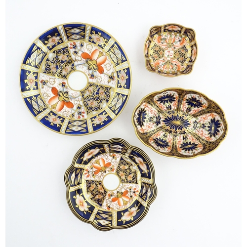 117 - Four assorted Royal Crown Derby dishes decorated in the Imari palette. Marked under. Largest approx.... 