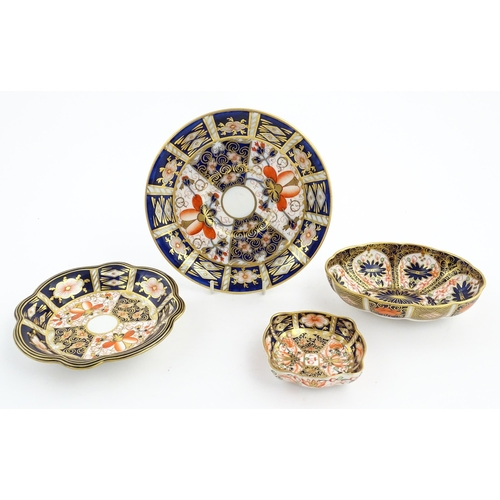 117 - Four assorted Royal Crown Derby dishes decorated in the Imari palette. Marked under. Largest approx.... 