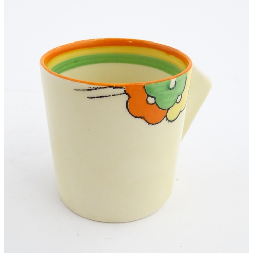 124 - An Art Deco Clarice Cliff tea cup and saucer decorated in the Nemesia pattern. Marked under. Cup app... 