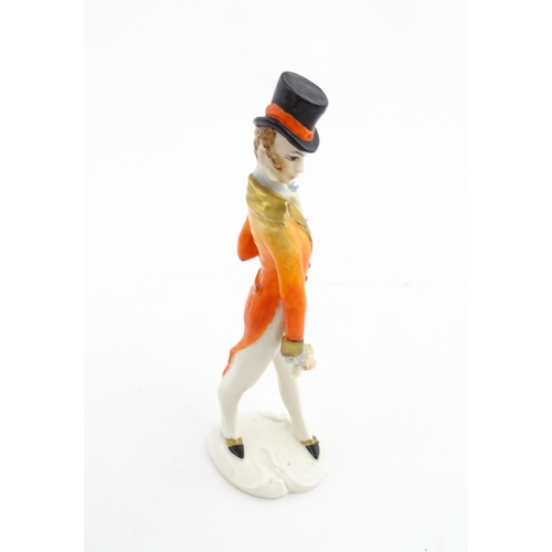 137 - A 20thC Italian Silvio Righetto figure modelled as a gentleman wearing a frock coat and a top hat. M... 