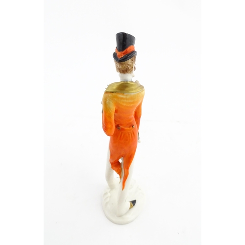 137 - A 20thC Italian Silvio Righetto figure modelled as a gentleman wearing a frock coat and a top hat. M... 