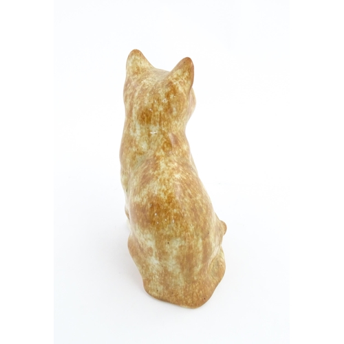 138 - A Winstanley model of a seated ginger cat. Marked under and numbered 26. Approx. 9