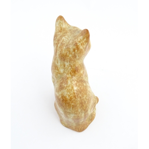 138 - A Winstanley model of a seated ginger cat. Marked under and numbered 26. Approx. 9