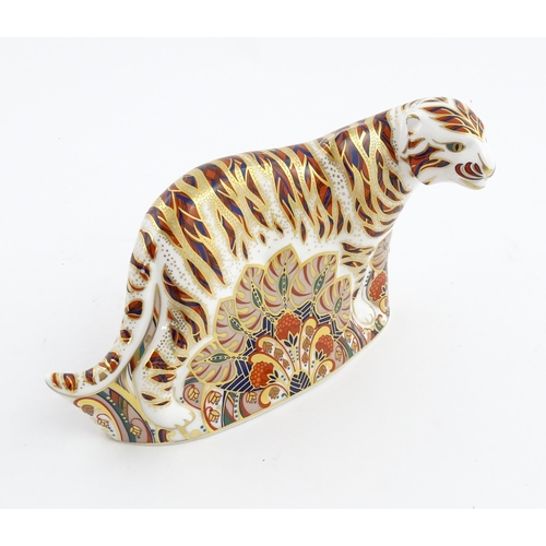 139 - A Royal Crown Derby paperweight modelled as a Bengal Tiger. Marked under. Approx. 5 1/4