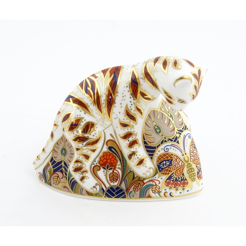 140 - A Royal Crown Derby paperweight modelled as a Bengal Tiger Cub. Marked under. Approx. 4