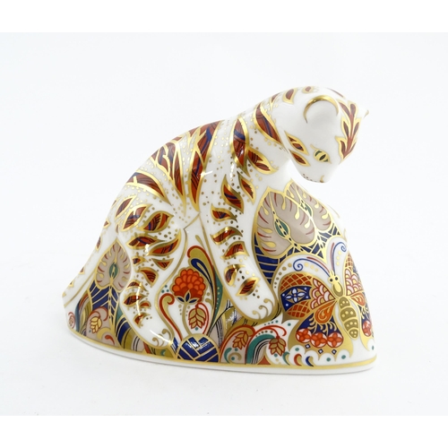 140 - A Royal Crown Derby paperweight modelled as a Bengal Tiger Cub. Marked under. Approx. 4