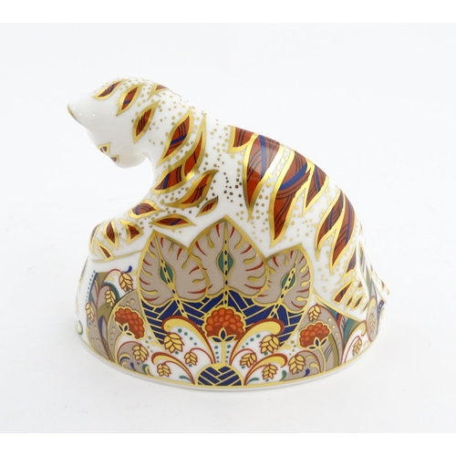 140 - A Royal Crown Derby paperweight modelled as a Bengal Tiger Cub. Marked under. Approx. 4