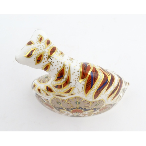 140 - A Royal Crown Derby paperweight modelled as a Bengal Tiger Cub. Marked under. Approx. 4