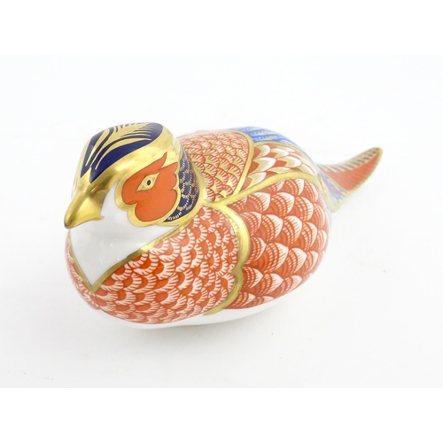 141 - A Royal Crown Derby paperweight modelled as a Pheasant. Marked under. Approx. 6 3/4