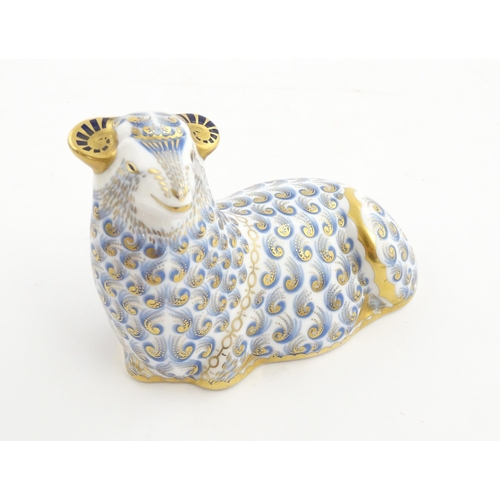 144 - A Royal Crown Derby paperweight modelled as a ram / sheep. Marked under. Approx. 3