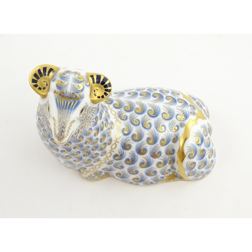 144 - A Royal Crown Derby paperweight modelled as a ram / sheep. Marked under. Approx. 3