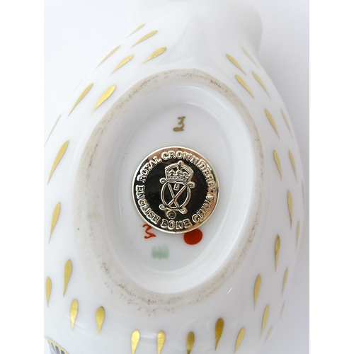 147 - A Royal Crown Derby paperweight modelled as an owl. Marked under. Approx. 3