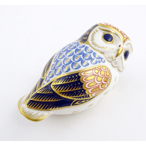 147 - A Royal Crown Derby paperweight modelled as an owl. Marked under. Approx. 3