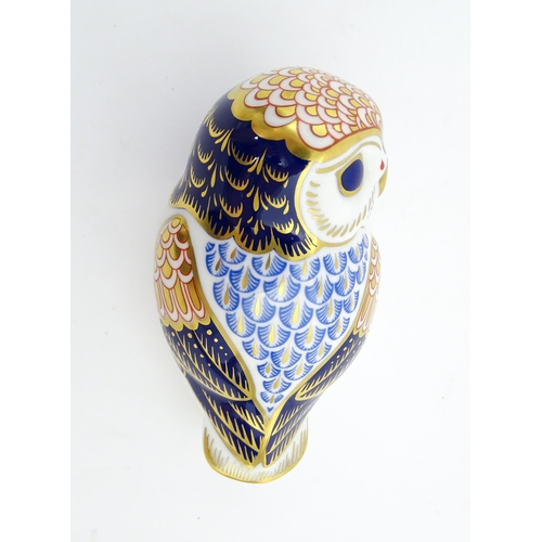 147 - A Royal Crown Derby paperweight modelled as an owl. Marked under. Approx. 3