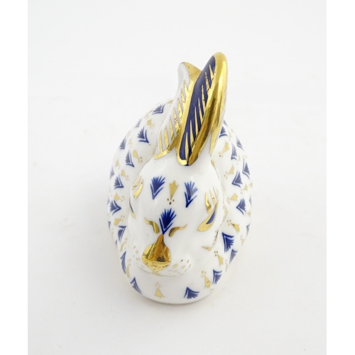 149 - A Royal Crown Derby paperweight modelled as a rabbit. Marked under. Approx. 3