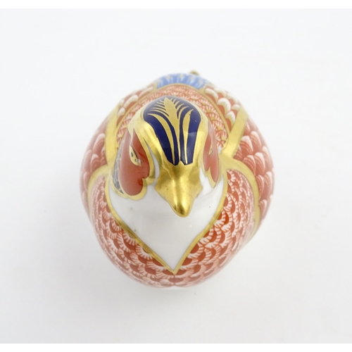 150 - A Royal Crown Derby paperweight modelled as a pheasant. Marked under. Approx. 6 3/4