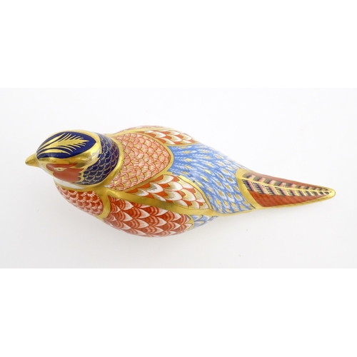 150 - A Royal Crown Derby paperweight modelled as a pheasant. Marked under. Approx. 6 3/4