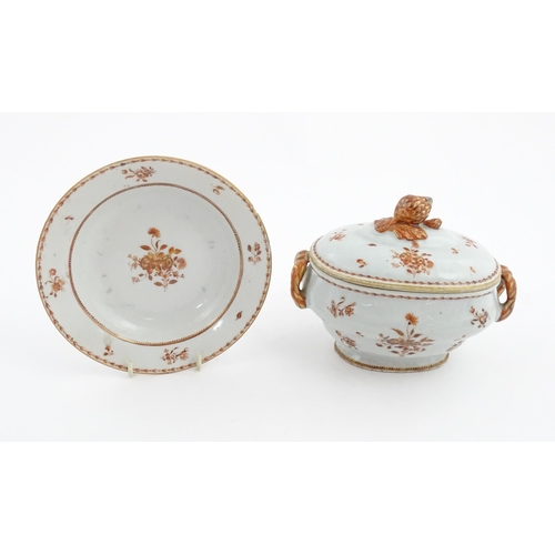 156 - Two items of porcelain decorated with orange flowers on a white ground, comprising a lidded sugar bo... 