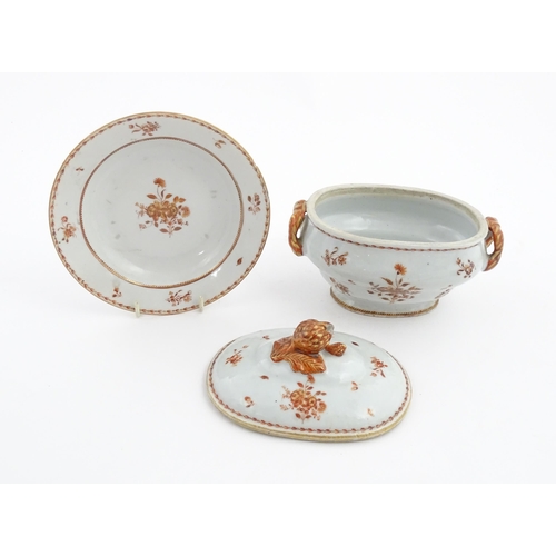 156 - Two items of porcelain decorated with orange flowers on a white ground, comprising a lidded sugar bo... 