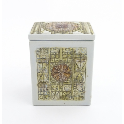 158 - A mid century retro Danish lidded pot of rectangular form with relief decoration designed by Kari Ch... 