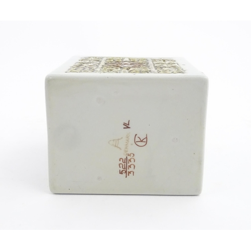 158 - A mid century retro Danish lidded pot of rectangular form with relief decoration designed by Kari Ch... 