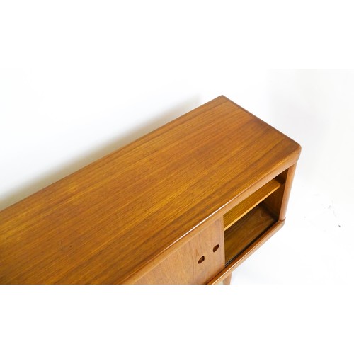 1648 - Vintage / Retro: A Danish teak sideboard designed by H.W.Klein for Bramin. With a bank of four drawe... 