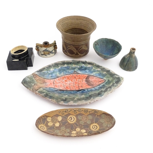 185 - A quantity of studio pottery wares to include a platter with hand painted fish decoration, a Contine... 