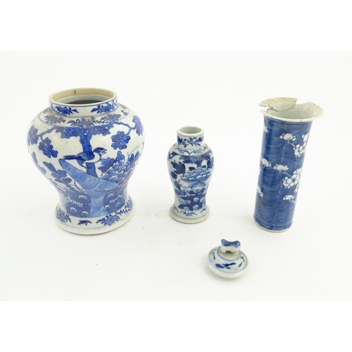 195 - Four Chinese blue and white items comprising a vase of baluster form decorated with birds and blosso... 