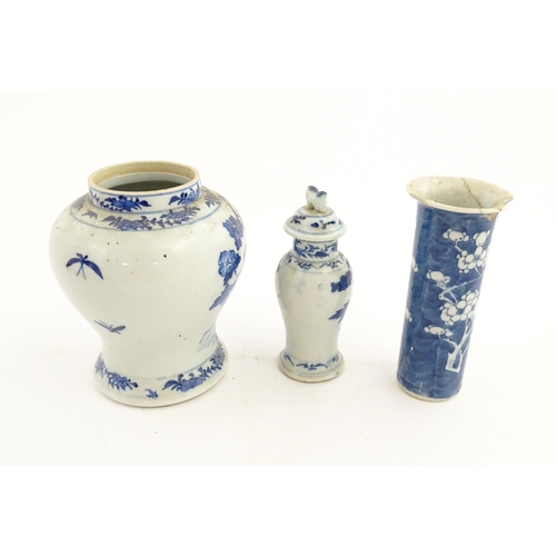 195 - Four Chinese blue and white items comprising a vase of baluster form decorated with birds and blosso... 