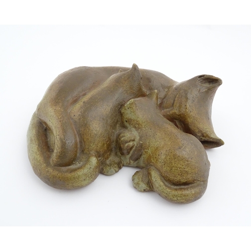 203 - A studio pottery sculpture modelled as three sleeping cats by Gillian Tregunna. Signed under Gil Tre... 