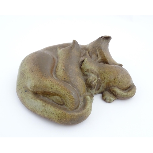 203 - A studio pottery sculpture modelled as three sleeping cats by Gillian Tregunna. Signed under Gil Tre... 