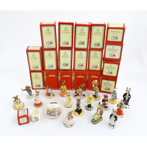 210 - A quantity of Royal Doulton Bunnykins models to include Nurse Bunnykins, Vicar Bunnykins, Chior Sing... 