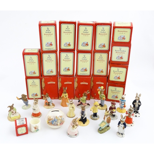 210 - A quantity of Royal Doulton Bunnykins models to include Nurse Bunnykins, Vicar Bunnykins, Chior Sing... 