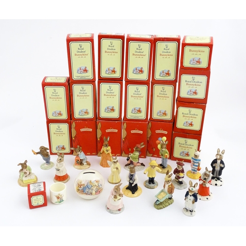 210 - A quantity of Royal Doulton Bunnykins models to include Nurse Bunnykins, Vicar Bunnykins, Chior Sing... 