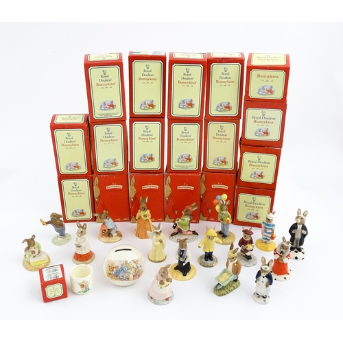 210 - A quantity of Royal Doulton Bunnykins models to include Nurse Bunnykins, Vicar Bunnykins, Chior Sing... 