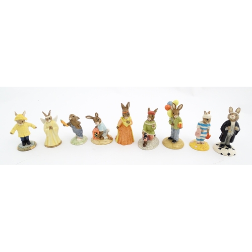 210 - A quantity of Royal Doulton Bunnykins models to include Nurse Bunnykins, Vicar Bunnykins, Chior Sing... 