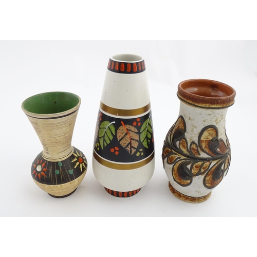 235 - Three West German vases to include a Dumler & Breiden vase with banded leaf detail, a Marei vase wit... 