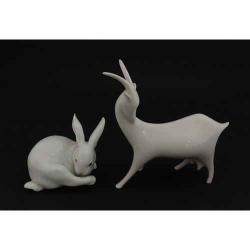 176 - A Lladro model Preening Rabbit, model no. 5906. Together with a Royal Dux model of a goat. Ibex appr... 