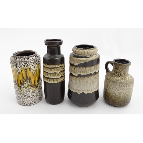 237 - Four West German vases to include a Scheurich vase with a mottled glaze and single handle, a Scheuri... 