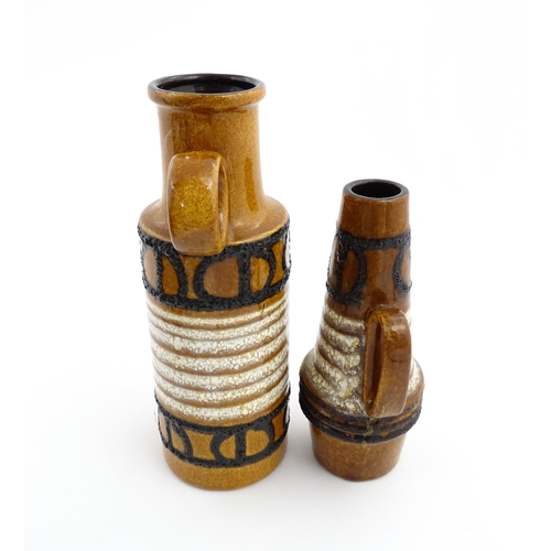 239 - Two West German Scheurich vases each with a single loop handle, both decorated with banded detail. M... 