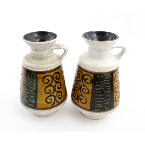 240 - A pair of West German Dumler & Breiden vases with single handle and banded scrolling decoration. Lar... 