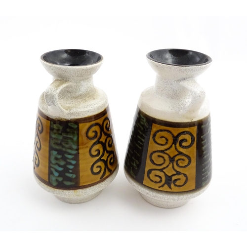 240 - A pair of West German Dumler & Breiden vases with single handle and banded scrolling decoration. Lar... 