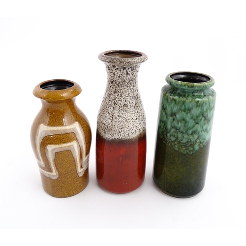 245 - Three West German Scheurich vases to include an example with a flared rim, mottle glaze and crimson ... 