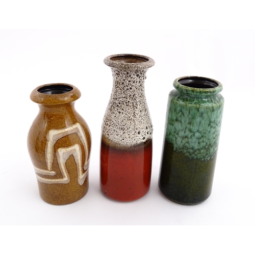 245 - Three West German Scheurich vases to include an example with a flared rim, mottle glaze and crimson ... 