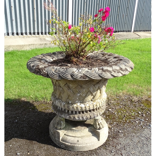 822 - Garden / Architectural : a large 19thC ornate stone urn planter, the upper section with weaved decor... 