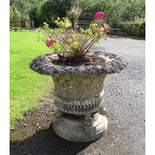 822 - Garden / Architectural : a large 19thC ornate stone urn planter, the upper section with weaved decor... 