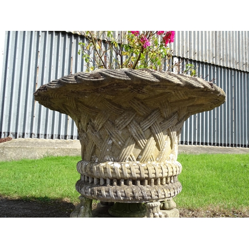 822 - Garden / Architectural : a large 19thC ornate stone urn planter, the upper section with weaved decor... 